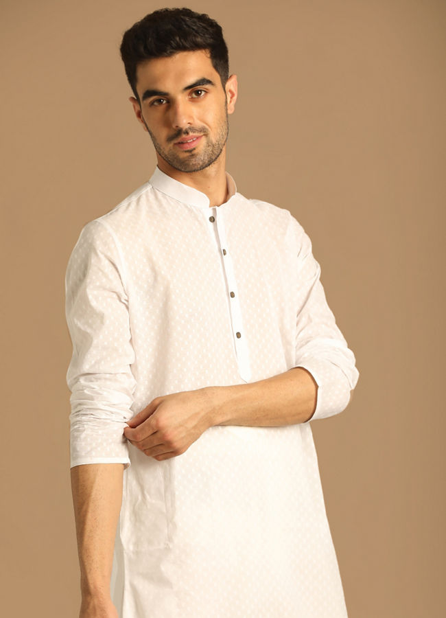 alt message - Manyavar Men White Self Booti Kurta Pajama image number 0